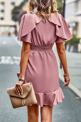 Robe à volants, col rond et manches flottantes